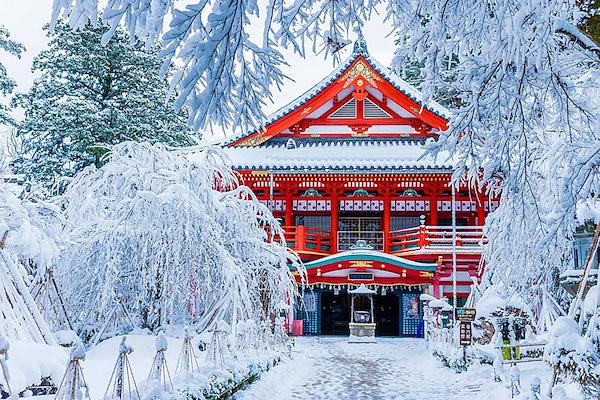 Beautiful Natadera Temple bright red in the snowy landscape