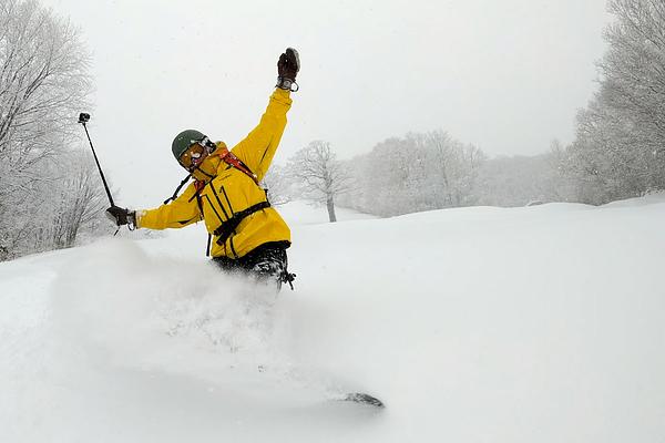 Kudo san embracing the perfect snow at Madarao Mountain Resort