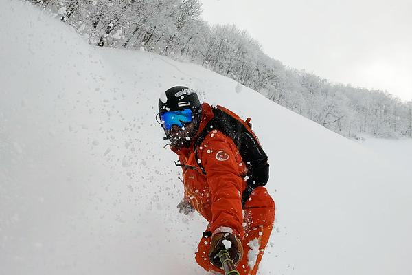 Dan riding untracked bottomless powder on the Tangram side of Madarao Mountain