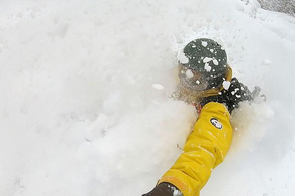 Kudo san riding the deepest powder possible without needing a snorkel