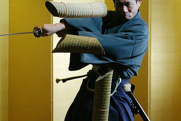 A samurai demonstrates sword play