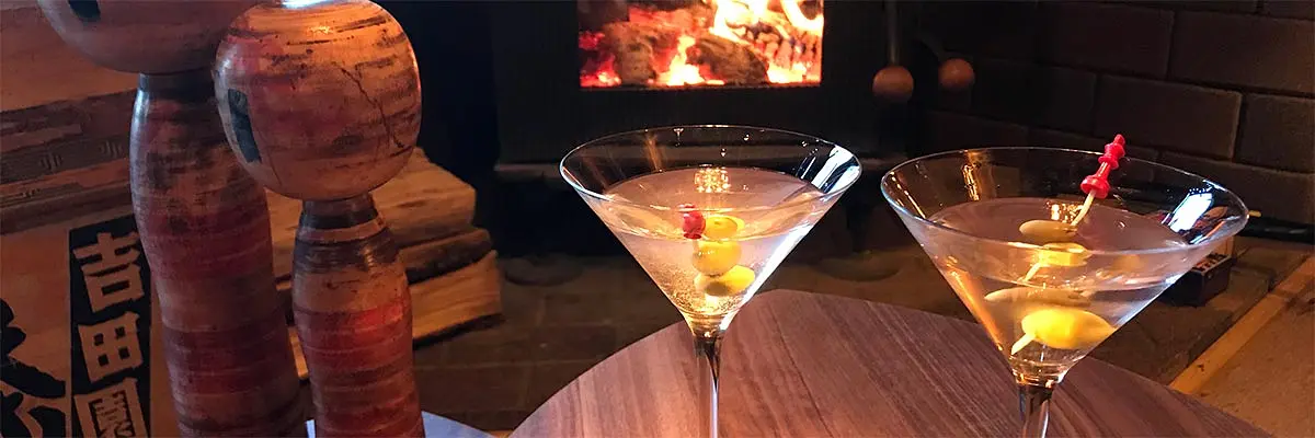 Martinis by the fire in the lounge of Snowball Chalet